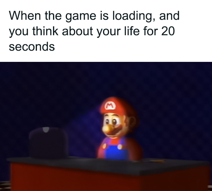 Mario meme with blurred graphics shows Mario sitting at a desk, deep in thought while the game is loading.