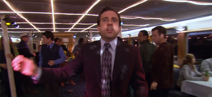 Michael Scott dancing on a boat party, showcasing his quirky and fun personality as the best boss ever.