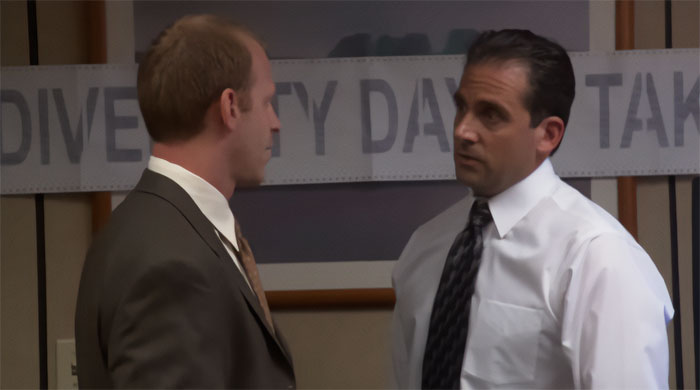 Michael Scott talking to Toby in an office setting, illustrating characters from popular Michael Scott quotes about leadership.
