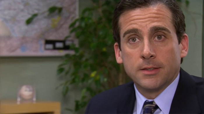 Michael Scott speaking in an office setting, showcasing one of the best boss ever quotes from the series.