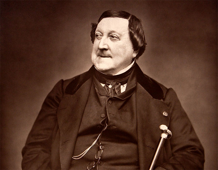 Sepia-toned portrait of Gioachino Rossini, a famous composer featured in amazing and bizarre music facts.