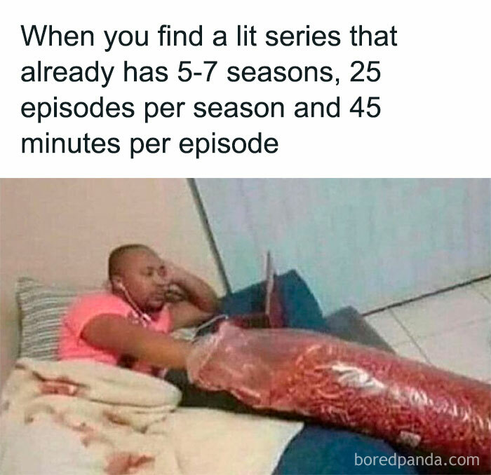 Man relaxing with laptop and snacks, humorously overwhelmed by series binge-watching; life memes about entertainment a*******n.