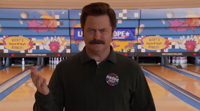 Ron Swanson teaching bowling techniques at a vibrant bowling alley, demonstrating skills with confidence and humor.