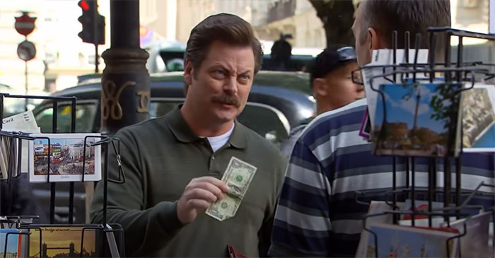 Ron Swanson handing a dollar to a street postcard seller, embodying life lessons from Ron Swanson quotes.