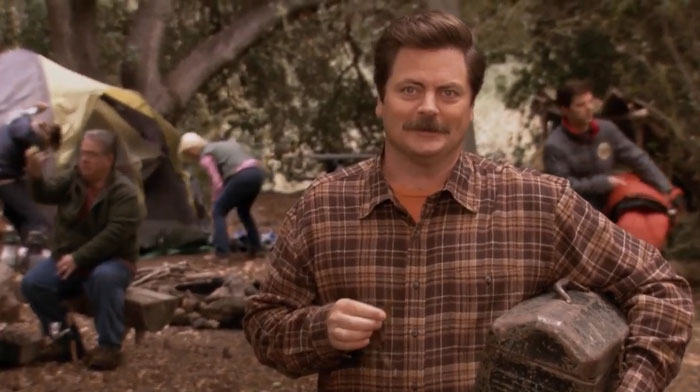 Ron Swanson camping outdoors in a forest, embodying classic Ron Swanson quotes about life and nature.