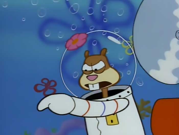Sandy Cheeks looking angry and pointing aggressively in a scene from iconic SpongeBob quotes collection.