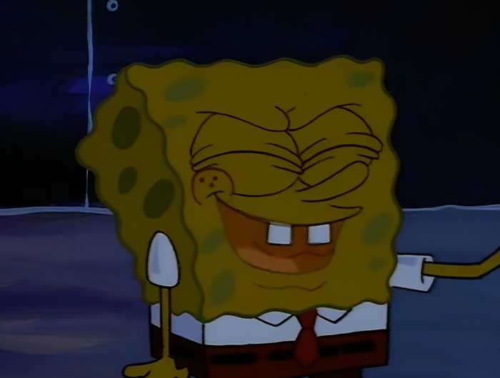 SpongeBob looking happy and smiling in the dark, featured in 104 iconic SpongeBob quotes you need to know.