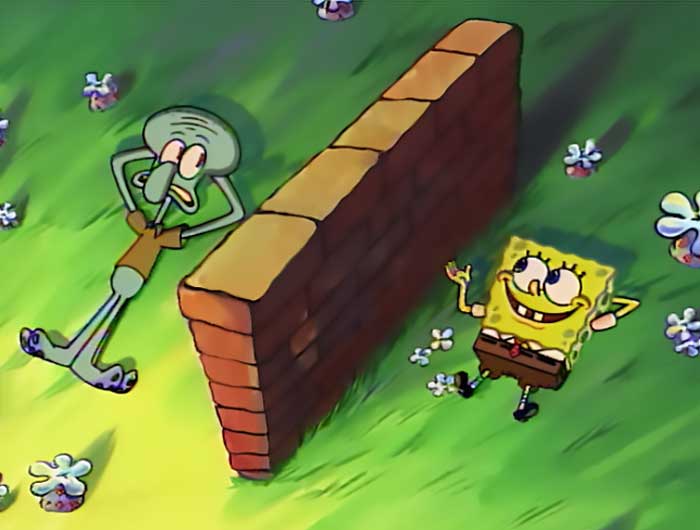 Squidward and SpongeBob lying on grass separated by a small brick wall in a scene from iconic SpongeBob quotes.