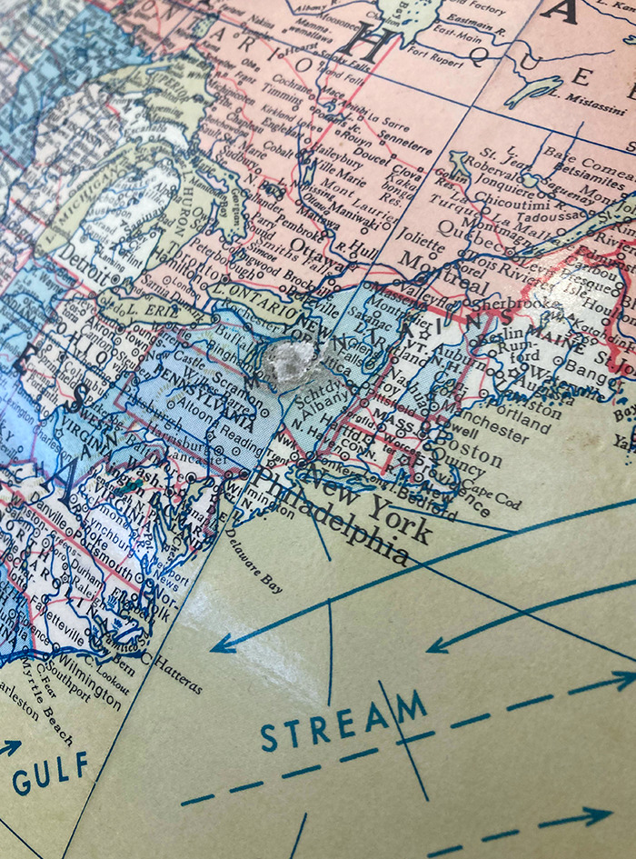 A Giant Globe At My Library Has A Worn-Down Spot Where Little Kids Put Their Fingers On Where We Live