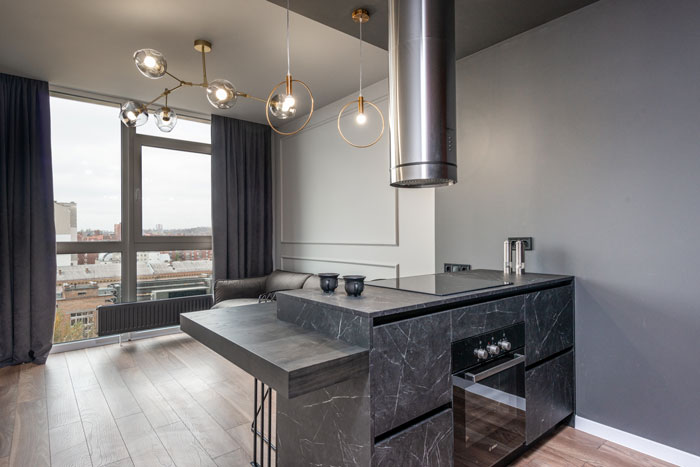 gray soapstone kitchen island in a contemporary minimalist style apartment gray soapstone kitchen island in a contemporary minimalist style apartment