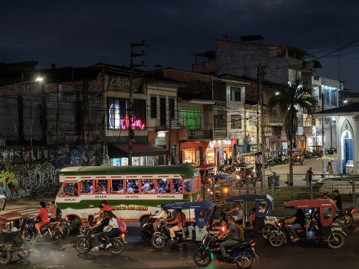 Moto taxis and vintage busses in Iquitos Moto taxis and vintage busses in Iquitos