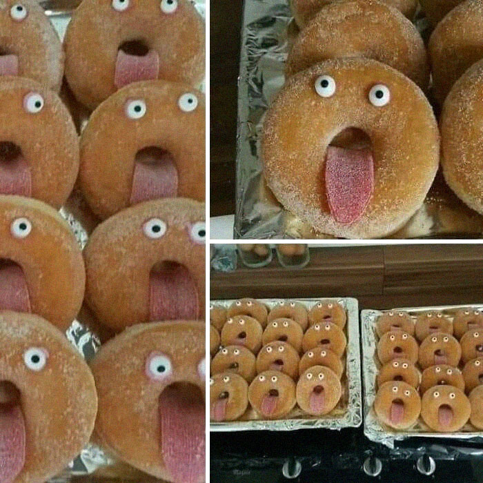 Cursed foods: donuts with sugar, eyes, and tongues, arranged on trays.