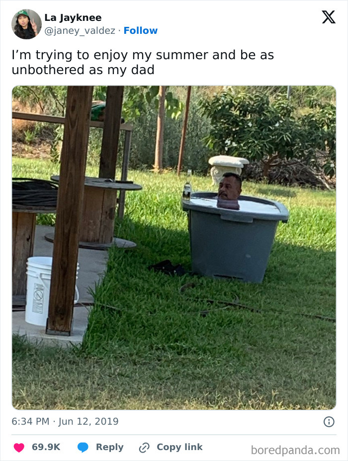Man relaxing in a bathtub filled with water in a garden, showcasing a humorous weather meme.