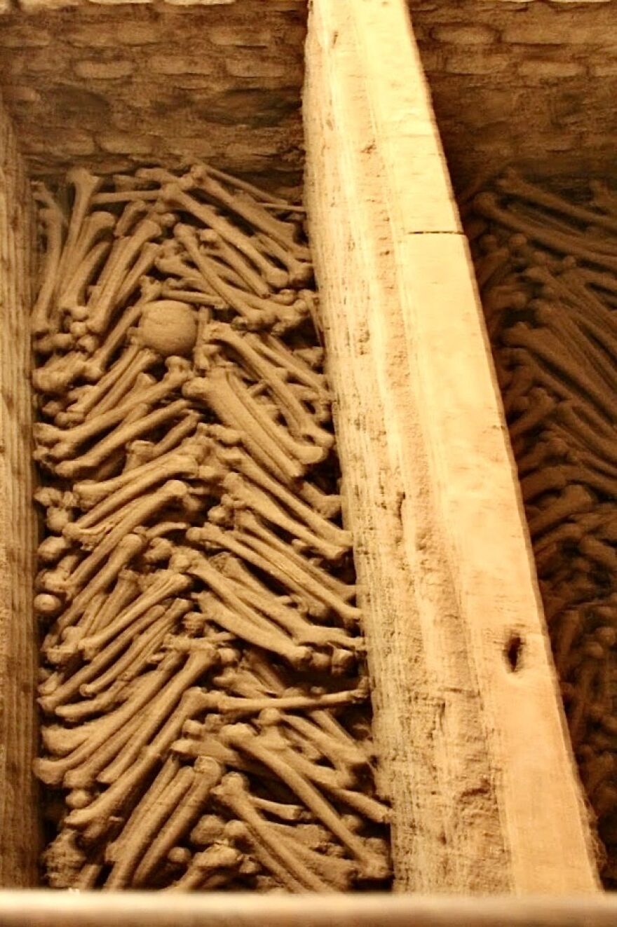 Human And Bones In The Catacombs