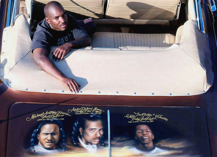 A picture of a man in a car