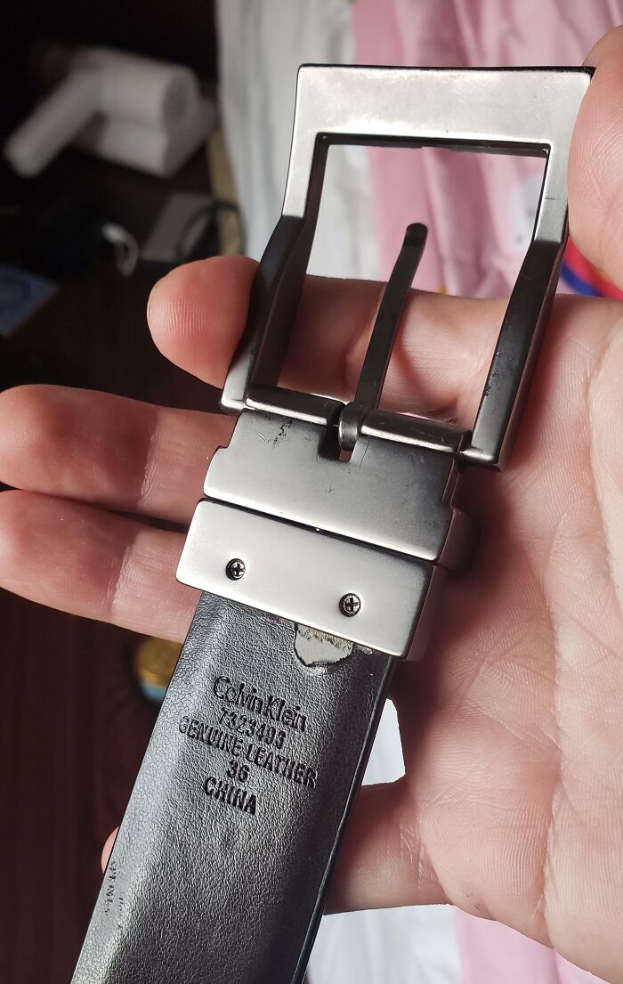 My "Genuine Leather" Calvin Klein Belt. Got Home, Tore Off The Tag Which Peeled Back The Plastic Coating Revealing The Rubber Core