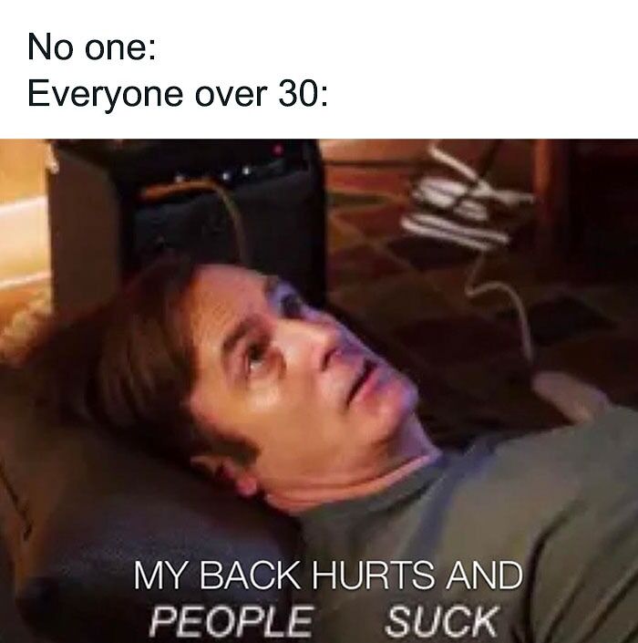 Man lying on floor with a humorous expression about back pain, relatable to people over 30; funny birthday meme.