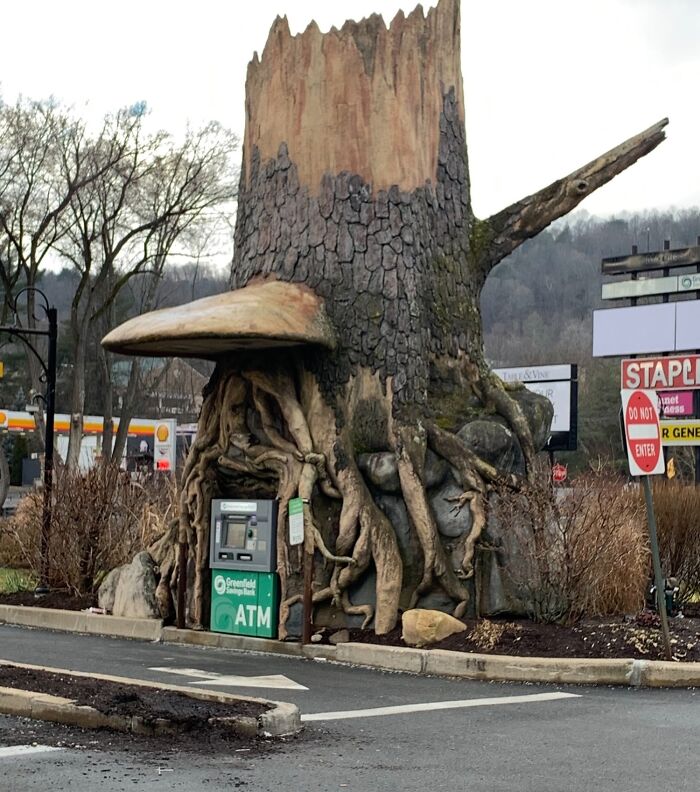 This ATM Is Decorated To Look Like A Tree Stump
