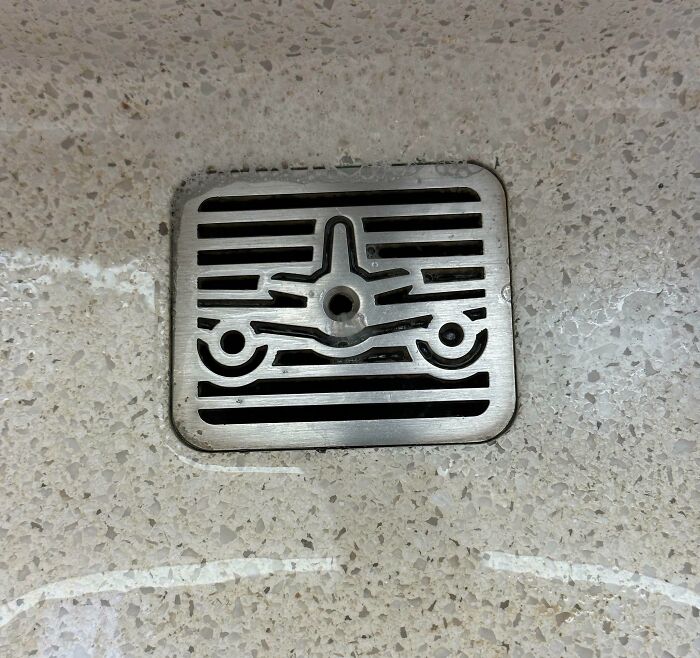 Sink Drain In An Airport Bathroom