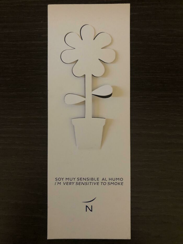 This Paper Cutout In My Hotel In Madrid That Changes Color If You Smoke In Your Room