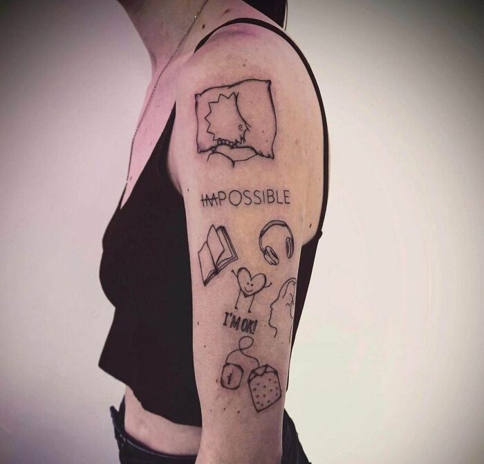 Person with patchwork style tattoos including headphones, book, and teabag on upper arm.