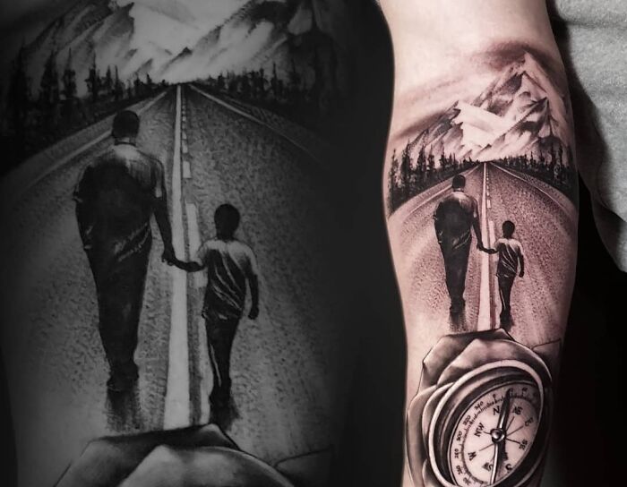 Tattoo of a family bond with a parent and child walking on a road towards mountains, symbolizing unbreakable connections.