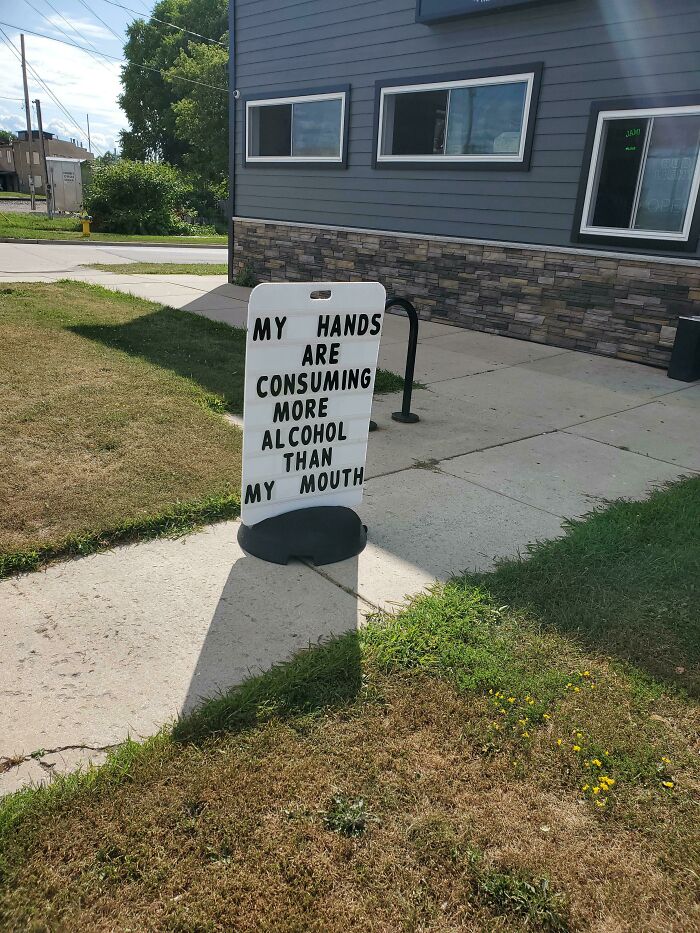 This Sign Posted Outside A Local Bar