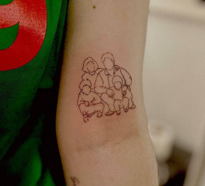 Minimalist family tattoo symbolizing unbreakable bonds on a forearm.
