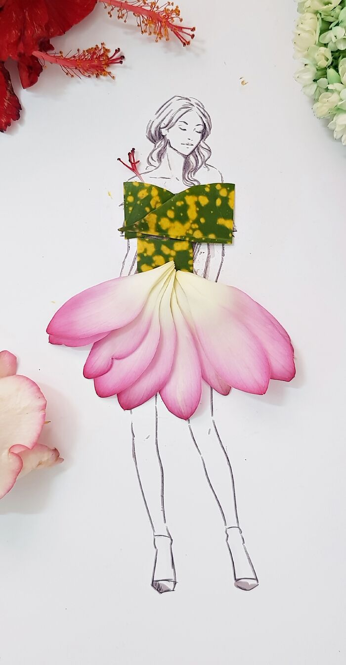 A drawing of a woman dressed in real flower petal gown