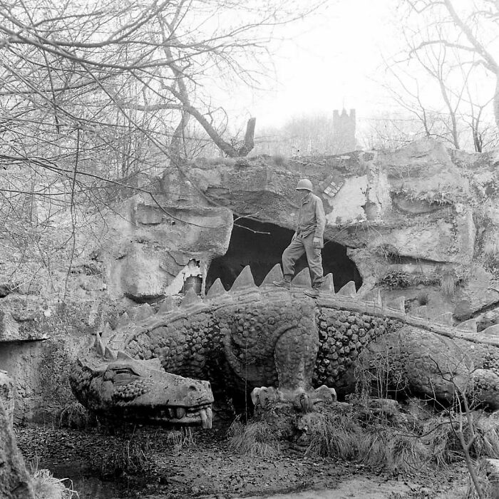 An American Soldier Poses On The Dragon At The “Nibelungenhalle” In Königswinter, North Rhine-Westphalia Germany - 1945