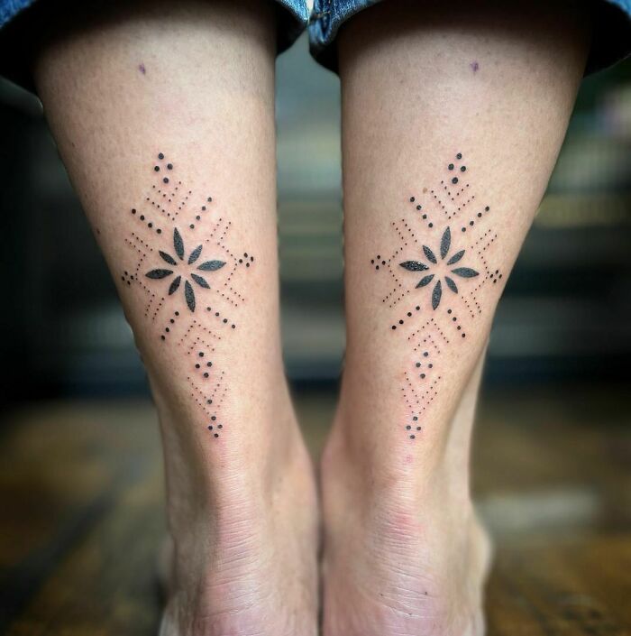 Minimalist dot and line ankle tattoos with geometric flower design, showcasing tattoo care and inspiration.