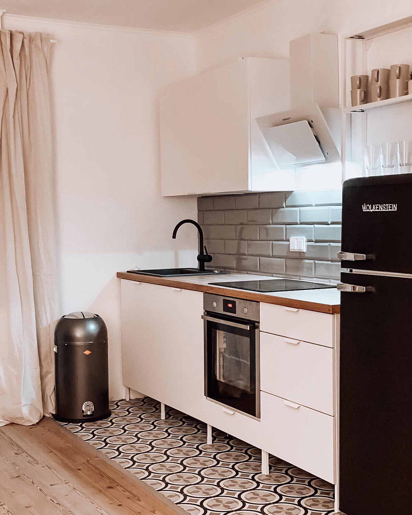Enhet kitchen system with white cabinets