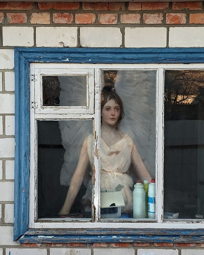 An image of an angel from "Angel" painting in modern surroundings