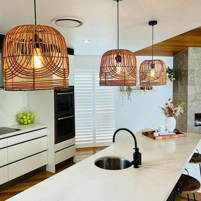 Kitchen with white table and lampshade pendants Kitchen with white table and lampshade pendants