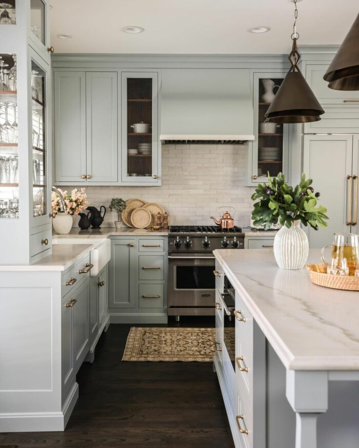 Kitchen with marble furnitures and black pendant lights Kitchen with marble furnitures and black pendant lights