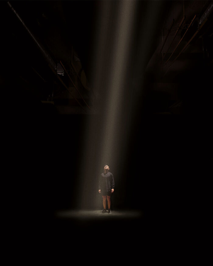 A photograph of a man in the light