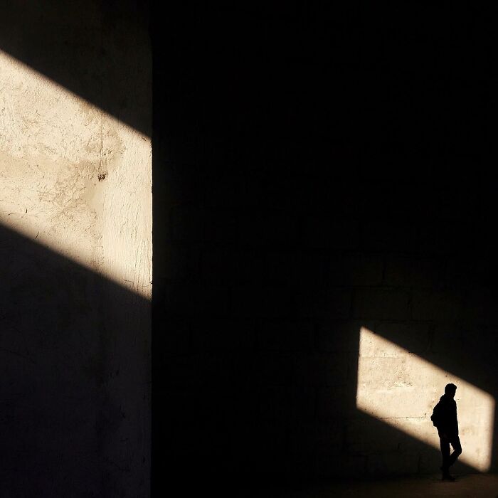 A photograph of a person in the light