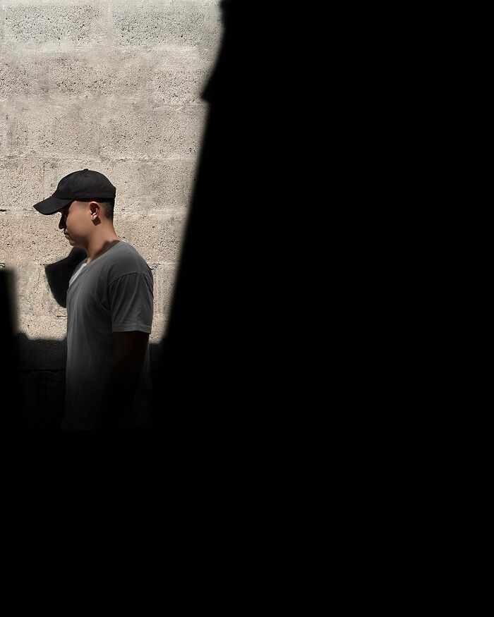 A photograph of a man in the light