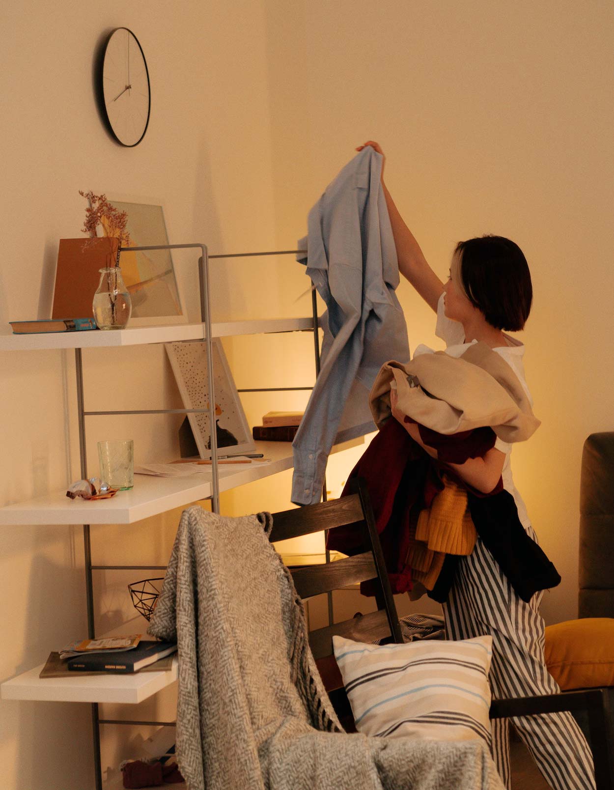 Woman tiding the house