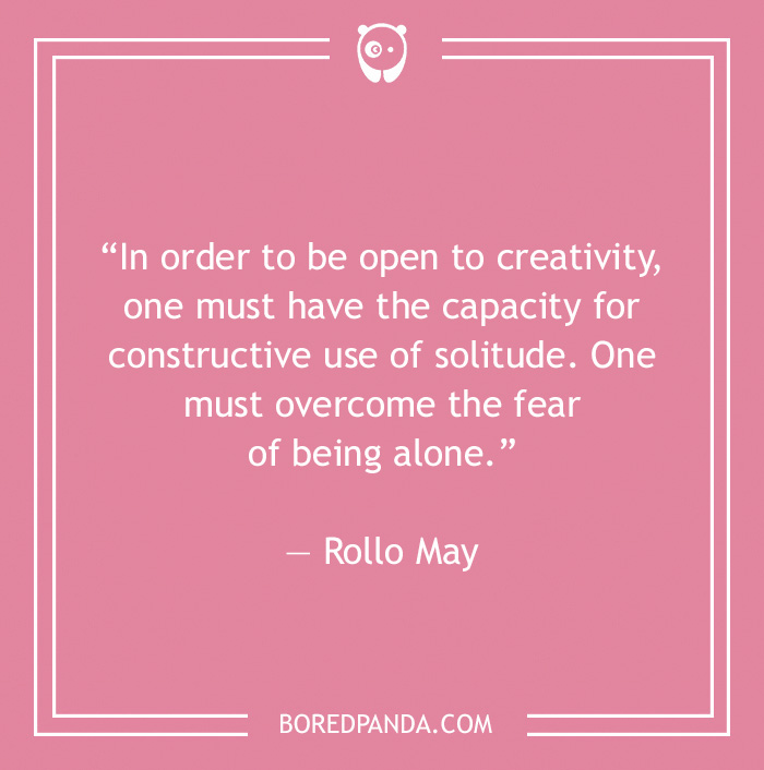 Quote on pink background about solitude and creativity by Rollo May, emphasizing the positive use of being alone.