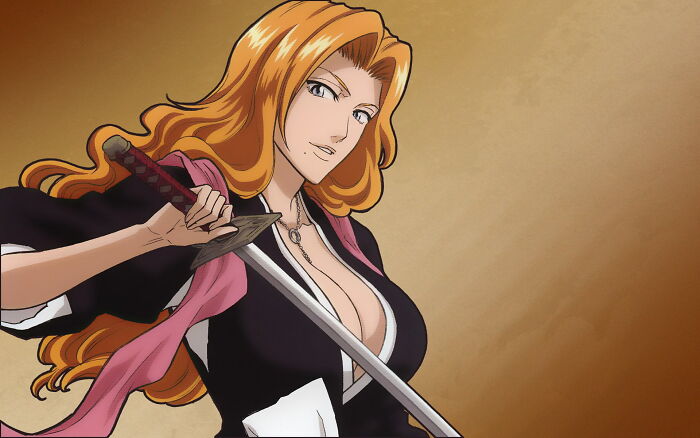 Matsumoto Rangiku from Bleach holding a sword in her hands
