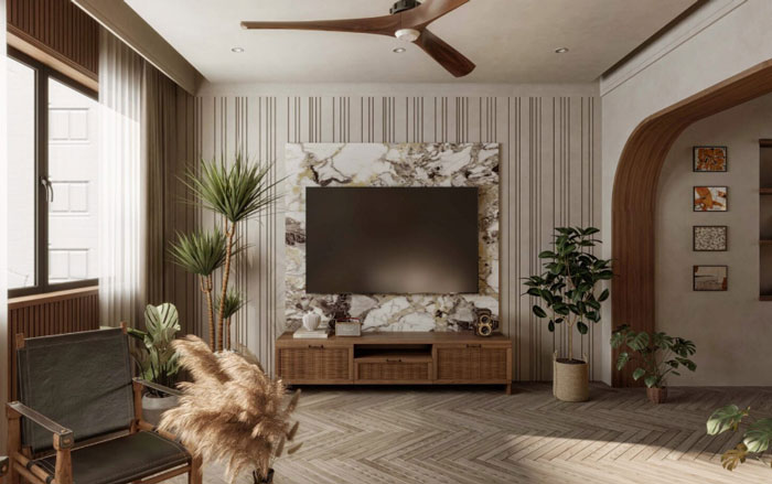 Living room with TV wall, coffee table, and plants showcasing unique boho decor ideas for a chic space.