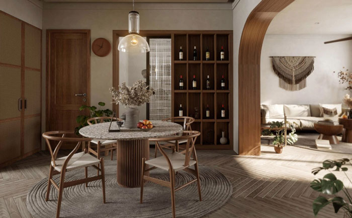 Dining room featuring a rounded table with flowers and white chairs, showcasing unique boho decor ideas for a chic space.