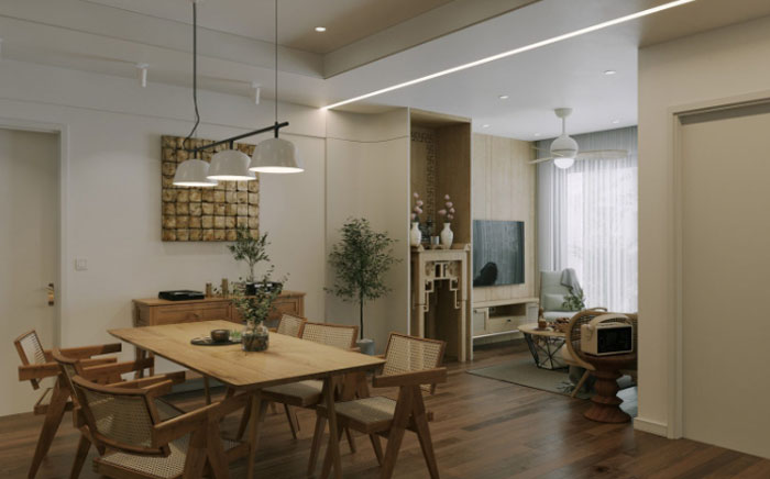 Boho decor dining room with wooden table, vase centerpiece, woven chairs, and natural light for a chic space.
