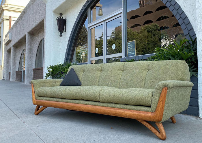 Sage green mid century three seater couch with wooden frame featured in a list of cheap couches for budget-friendly decor. Sage green mid century three seater couch with wooden frame featured in a list of cheap couches for budget-friendly decor.