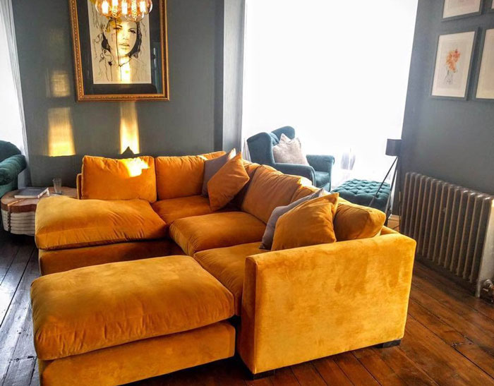 Large mustard-colored convertible couch in a cozy living room, highlighting a stylish and budget-friendly cheap couch option. Large mustard-colored convertible couch in a cozy living room, highlighting a stylish and budget-friendly cheap couch option.