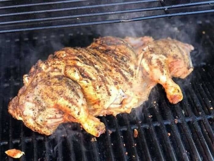 Grilled chicken in an unusual shape, showcasing one of the most cursed foods that might make your stomach turn.