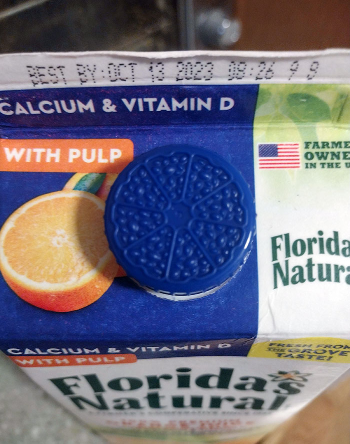 This Orange Juice Cap Has The Shape Of A Sliced Orange On It