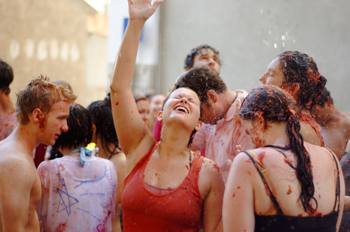 People enjoying La Tomatina festival in Buñol, Spain, showcasing culture facts reflecting diversity and beauty of the world.