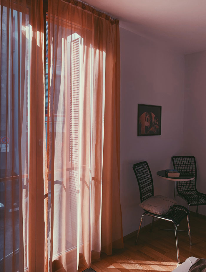 pink curtains on the balcony window